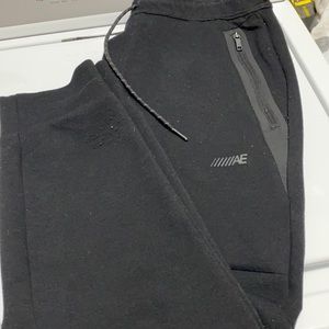 Men’s size Medium American Eagle Joggers. Black with black zipper pockets.
